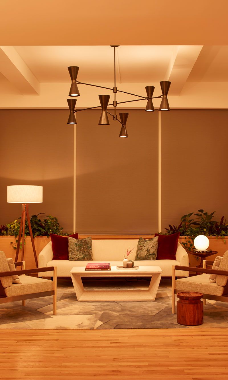 warm-toned lighting from lutron in a loft