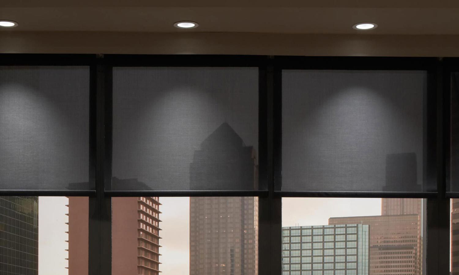 black lutron shades in a city view apartment