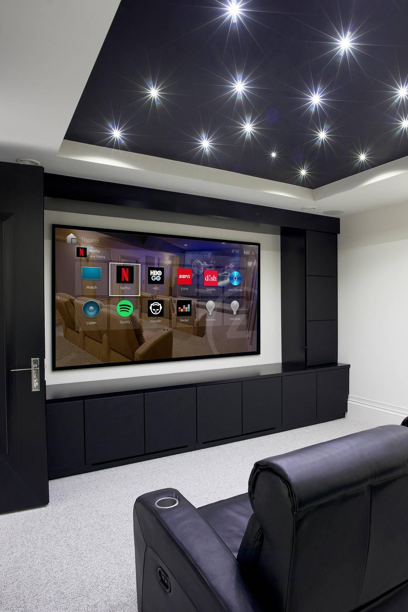 Control4 interface on a theater screen with bright star ceilings