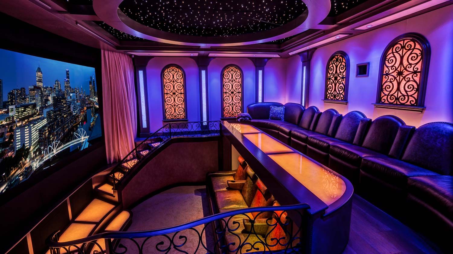 blue and purple lit up theater with fortress seating