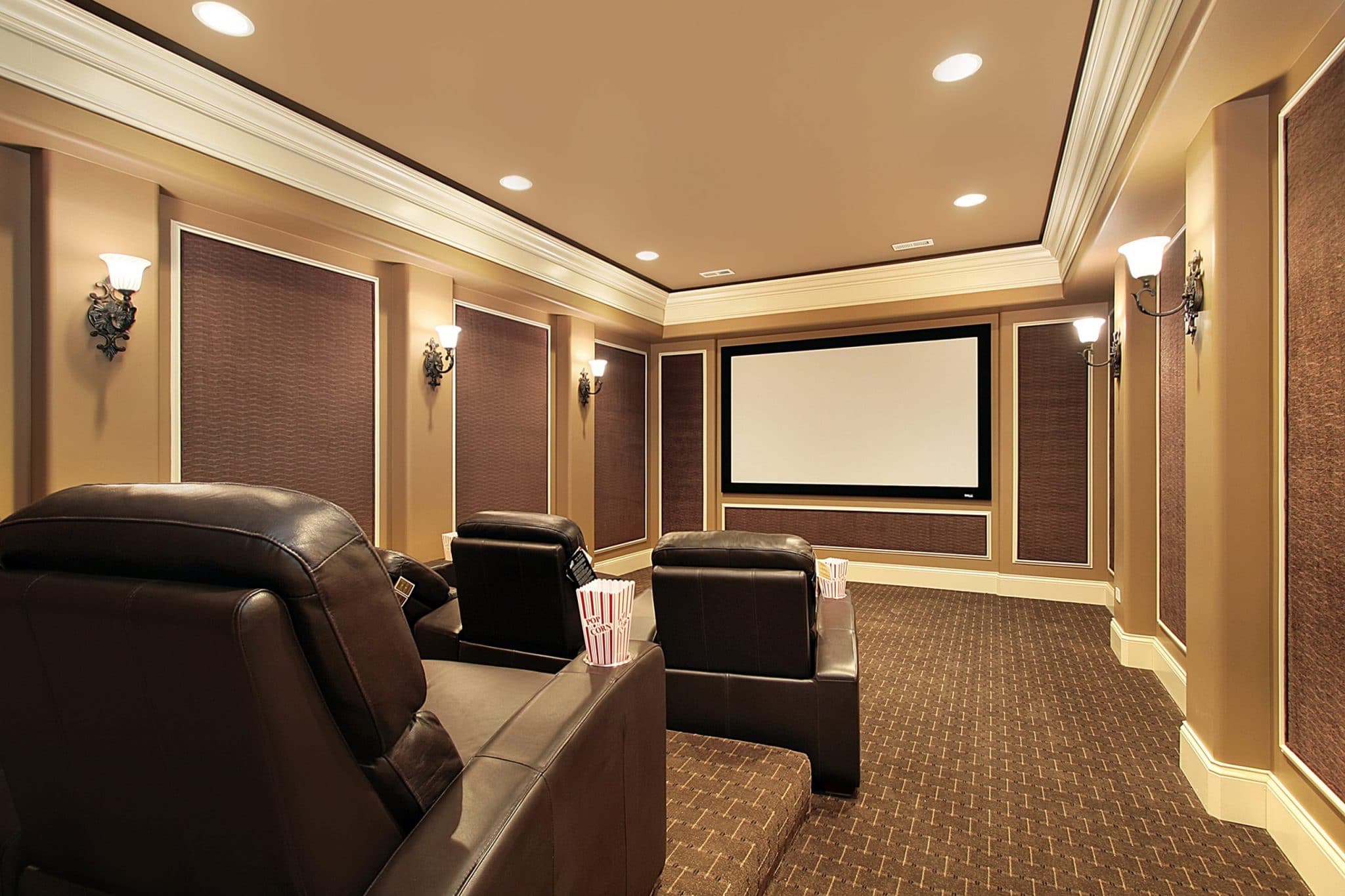 Home theater in luxury house with large TV screen