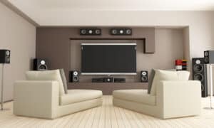 A home theater with surround sound speakers.
